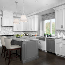The Hampshire kitchen is crafted with maple wood and a white and custom finish. Cabinets crafted in Michigan since 1958.
