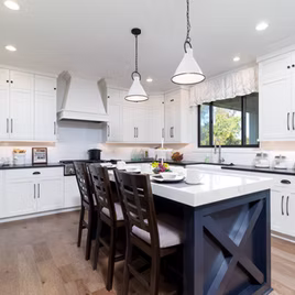 The New Shaker kitchen is crafted with Maple wood with a white finish. The island is maple wood with a graphite finish. Call 586-247-1140 or visit our showrooms in Shelby Township and West Bloomfield to find out more information.