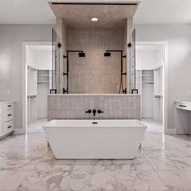 The New Shaker bathroom from Lafata Cabinets uses maple wood with a white finish. Cabinets crafted in Michigan since 1958.