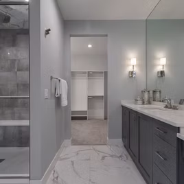 The Shaker bathroom is crafted with Maple wood with a custom finish.
