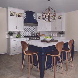 This Brookhaven Kitchen style from LaFata Cabinets has a white finish for the perimeter and a Sherwin-Williams Naval for the island. Cabinets crafted in Michigan since 1958.