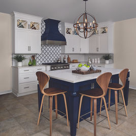 This Brookhaven Kitchen style from LaFata Cabinets has a white finish for the perimeter and a Sherwin-Williams Naval for the island. Cabinets crafted in Michigan since 1958.