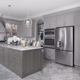 This Brookhaven style has Maple wood and all custom color for the perimeter and the island. Cabinets crafted in Michigan since 1958.