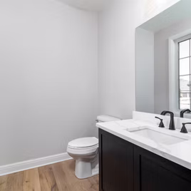 The  New Shaker bathroom is crafted with Maple wood with a graphite finish.
