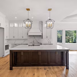 One of the many Brookhaven kitchens crafted by LaFata Cabinets. This kitchen is built with Maple wood with a white and espresso finish. Cabinets crafted in Michigan since 1958.