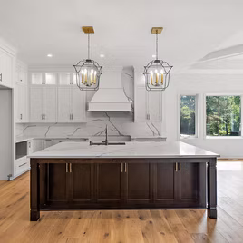 One of the many Brookhaven kitchens crafted by LaFata Cabinets. This kitchen is built with Maple wood with a white and espresso finish. Cabinets crafted in Michigan since 1958.