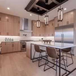 The Midwest kitchen is crafted with white oak wood with a custom finish. Call 586-247-1140 or visit our showrooms in Shelby Township & West Bloomfield to find out more information. 