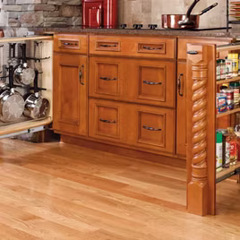 This pullout organizer is one of the most deceiving and convenient. The pull-out is attached to a filler. When closed, appears as just a decorative piece. There are a variety of options such as shelving, pegs, etc to fit your needs.