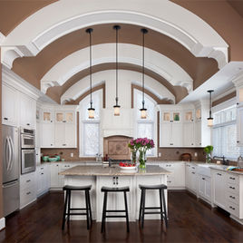 The Brookhaven kitchen is crafted with Maple wood and a white finish perimeter.  Cabinets crafted in Michigan since 1958.