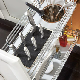 This Base Cabinet Pullout Knife/Utensil Base Organizer by Lafata Cabinets unit features two knife inserts, stainless steel utensil bin, and an adjustable shelf for lower storage. Made in Michigan.