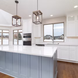 The New Shaker kitchen is crafted with Maple wood with a white finish. The island is maple wood with a custom paint finish. Call 586-247-1140 or visit our showrooms in Shelby Township and West Bloomfield to find out more information.