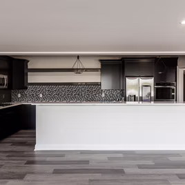 The Midwest kitchen is crafted with a maple wood and a graphite finish. Call 586-247-1140 or visit our showrooms in Shelby Township & West Bloomfield to find out more information. 