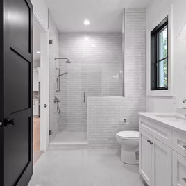 The New Shaker bathroom from Lafata Cabinets uses maple wood with a custom finish. Cabinets crafted in Michigan since 1958.