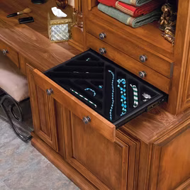 This pull-out drawer organizer has awesome compartments to store all of your jewelry. It has compartmentalized sections to organize each type.