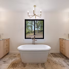 The Midwest bathroom from Lafata Cabinets uses white oak wood with a custom finish. Cabinets crafted in Michigan since 1958.