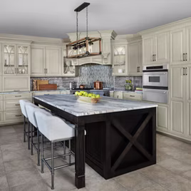 The Jamestown kitchen is crafted with maple wood and a pewter & java finish. Cabinets crafted in Michigan since 1958.