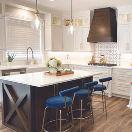 The Brookhaven style kitchen is crafted with Maple wood with a white and Kodiak finish. Cabinets crafted in Michigan since 1958.