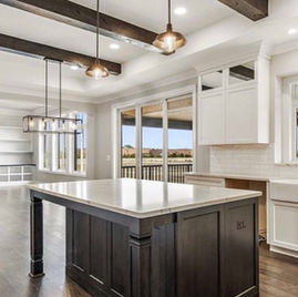 The Brookhaven II is crafted with Maple wood and a white finish perimeter. The island is crafted with maple wood and a kodiak finish. Cabinets crafted in Michigan since 1958.