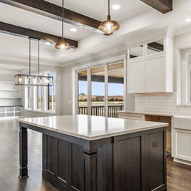 The Brookhaven II is crafted with Maple wood and a white finish perimeter. The island is crafted with maple wood and a kodiak finish. Cabinets crafted in Michigan since 1958.