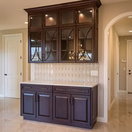 The Hampshire Bar from Lafata Cabinets uses maple wood with a Toffee finish. Cabinets crafted in Michigan since 1958.