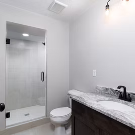 
The New Shaker Bathroom from Lafata Cabinets uses maple wood with a java finish. Cabinets crafted in Michigan since 1958.
