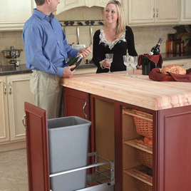 This organization option features a pullout drawer with an aluminum waste container. There are side bars attached for security. Made in Michigan.