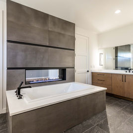 The Midwest bathroom from Lafata Cabinets uses white oak wood with a custom finish. Cabinets crafted in Michigan since 1958.